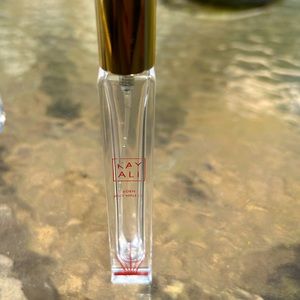 Kayali Eden Juicy Apple travel size perfume bottle